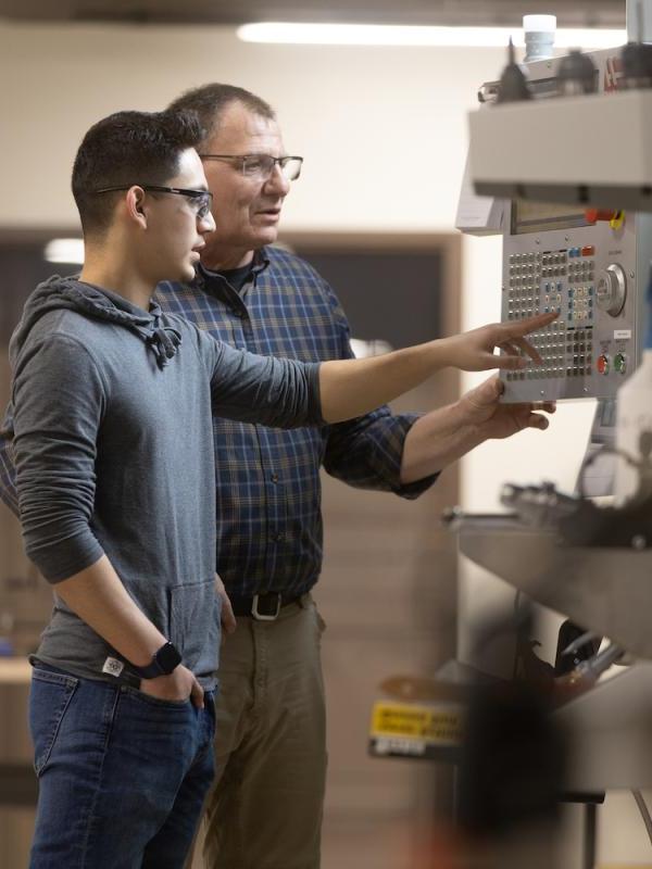 Student and Professor in IME lab